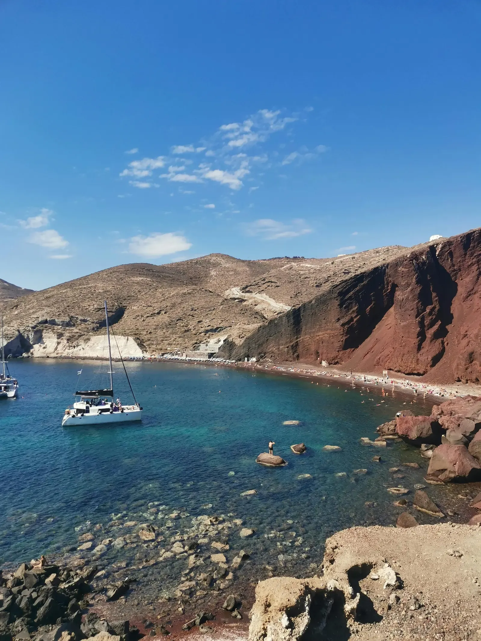 Catamaran anchored in Santorini caldera